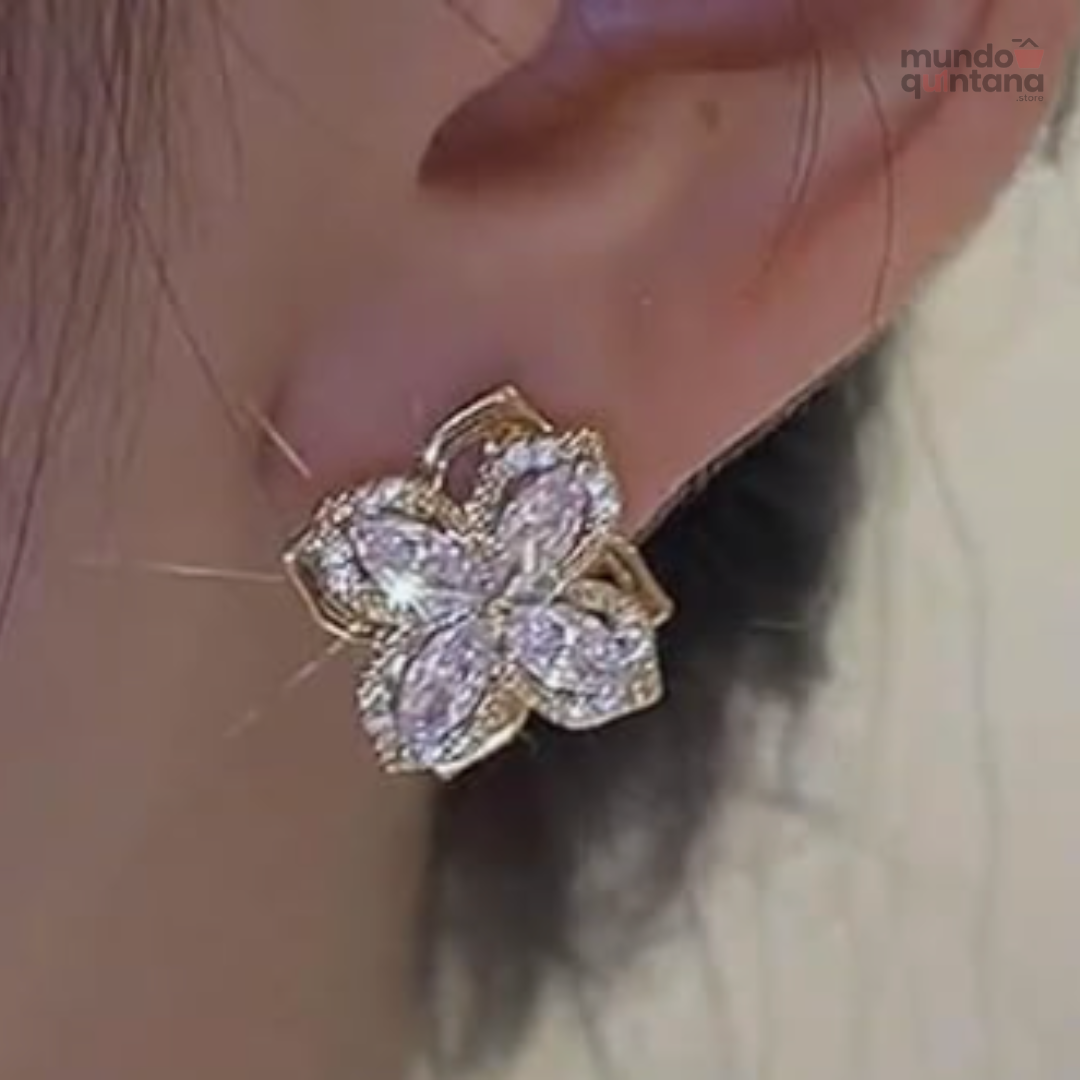 Aretes Flor Giratoria (Anti-estrés & Moda)